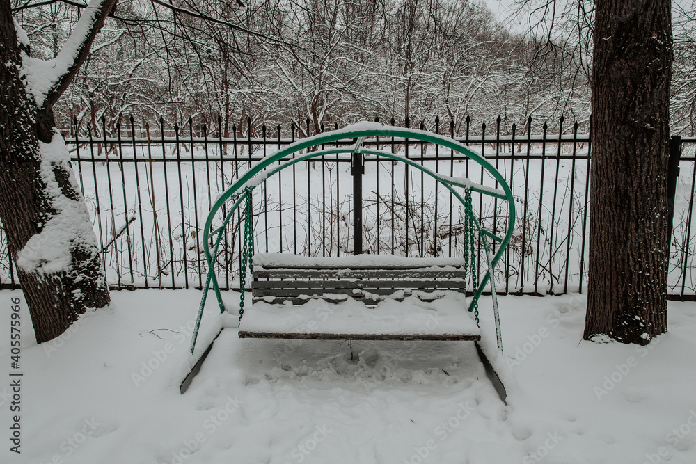 Unusual park bench covered with snow. Russia Unusual park bench covered with snow. Russia