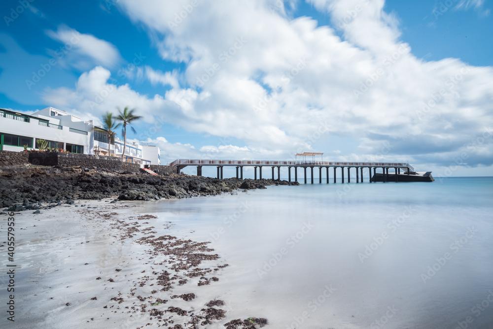 Pier of the beach of the town of Arrieta, in Lanzarote, at low tide