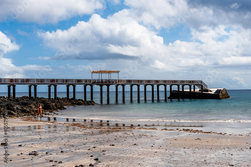 Pier of the beach of the town of Arrieta  in Lanzarote  at low tide
