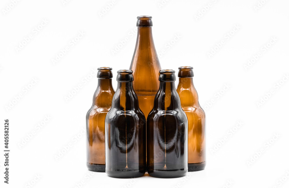 A row of empty brown bottles A row of empty brown bottles