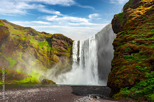 Incredible view on famous Skogafoss waterfall on Skoga river. Iceland, Europe. Landscape photography