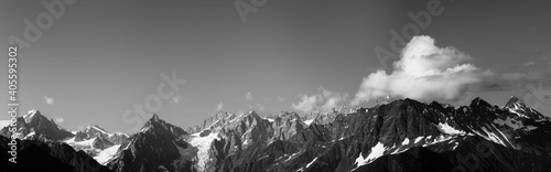 Panorama of high rocky mountains with glacier