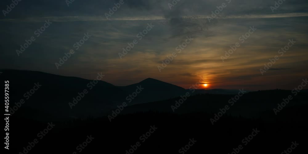 Timelaps sunrise in mountains. video about the movement of the sun over the mountains Timelaps sunrise in mountains. video about the movement of the sun over the mountains