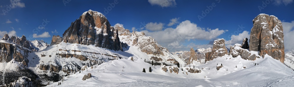 scenic winter landscape in the Cortina d'Ampezzo Dolomites. Tofana di Rozes mountain group and the Cinque Torri (five towers group). Veneto, Italy.