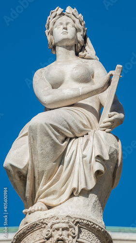 Statue of beautiful woman as musician and singer of State Opera fountain in Vienna  Austria  details  closeup.