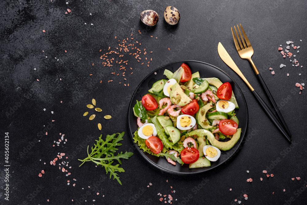 Salad with shrimp, avocado, cucumber, pumpkin seeds and flax seeds with olive oil Salad with shrimp, avocado, cucumber, pumpkin seeds and flax seeds with olive oil