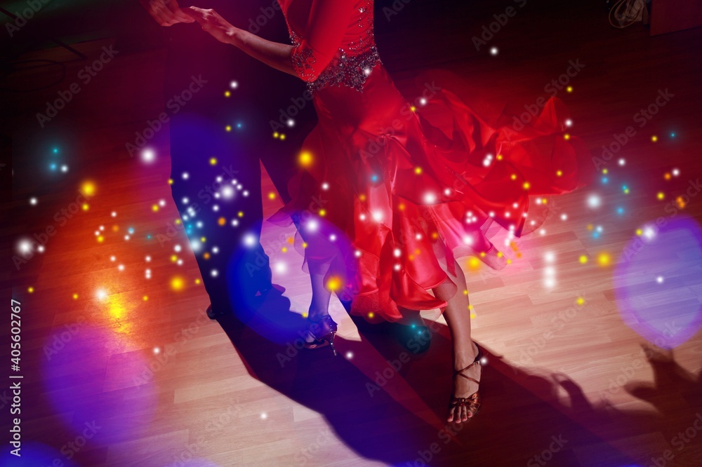 Man and woman feet dancing salsa on floor