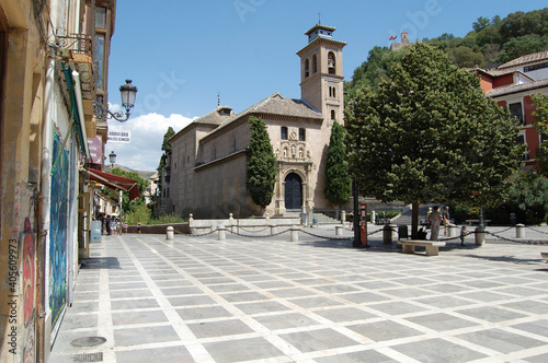 View of the streets and old buildings of Granada, historic city of Andalusia (Spain). Isabel la Catolica square