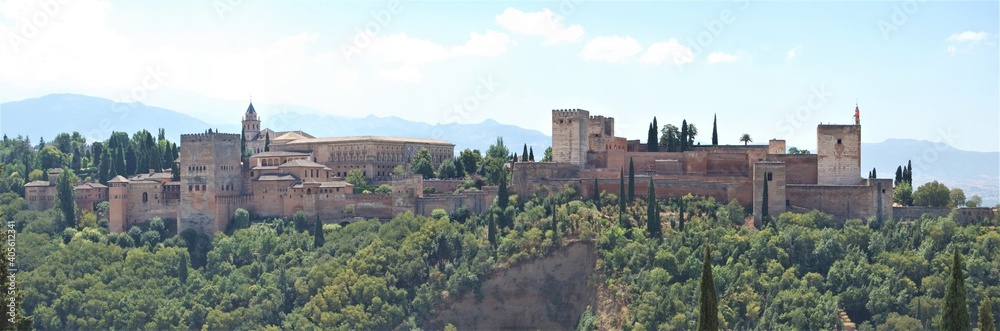 View of the streets and old buildings of Granada, historic city of Andalusia (Spain). The Alhambra from the viewerpoint of San Nicolas.
