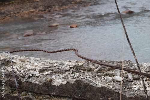 Old rusted rebar ribar from a crumbling bridge photo