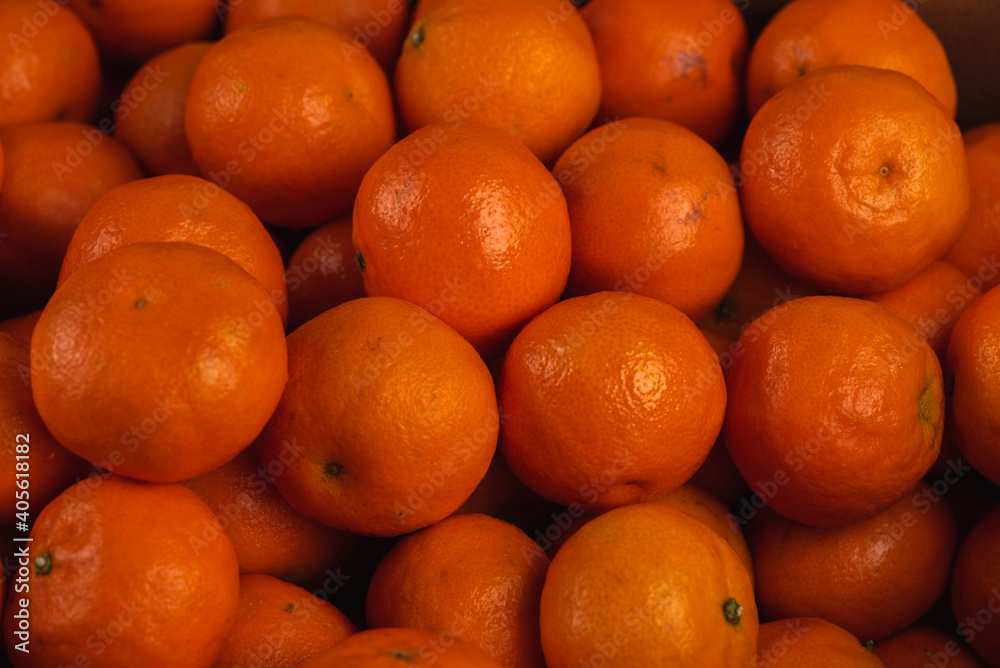 Fresh mandarin oranges fruit or tangerines, as background, background. Selective focus Fresh mandarin oranges fruit or tangerines, as background, background. Selective focus