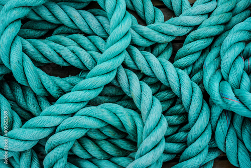 close up of rope on a blue background © Bartosz