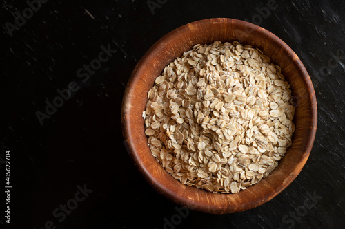 wooden bowl of oats 