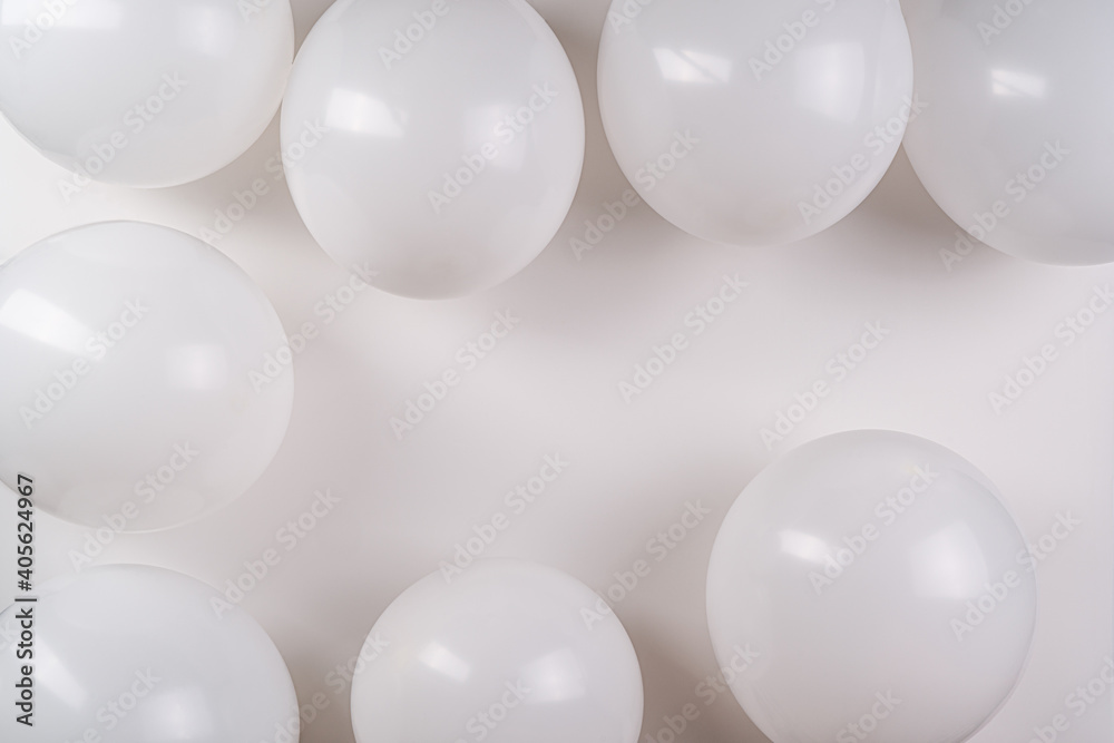 White balloons on white background with copy space.Wedding and  greeting card.