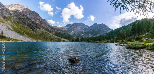Tableau sur toile The nature and landscape of the alps seen from the shores of Lake Arpy, in the Aosta Valley, near the town of La Thuile, Italy - August 2020