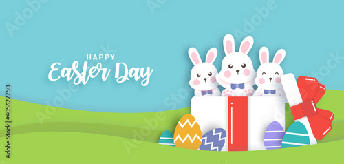 Easter day background with  cute rabbiit in a gift box.