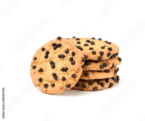 stack of round baked cookies with chocolate pieces isolated on white background