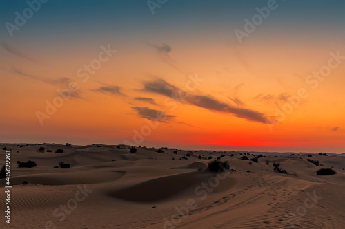 Sand dunes and a night sky after sunset in the desert outside Dubai  UAE in springtime