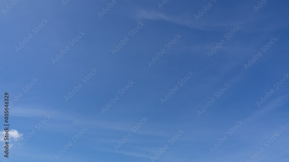 wispy airy transparent clouds in a fan shape. travel over blue sky horizontal left to right. slow-moving clouds in daylight. b-roll timelapse footage of skycaps cloudscape background wallpaper. 