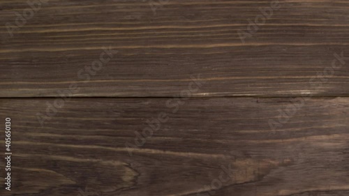 Wallpaper Mural Women's hands in a knitted sweater take a cup of tea with lemon from the table of dark boards. Close-up. Torontodigital.ca