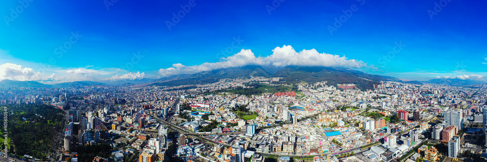 Aerial panorama showing the many houses and highrises in Quito, the capital of Ecuador, South America