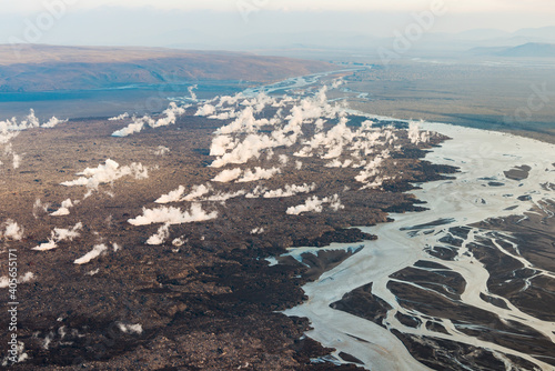 Aerial view of steam where lava flows over a river, Holuhraun 2014, Iceland photo