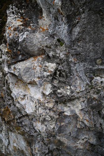 The texture of the rock. Mountain cliff of rock surface. Natural cave wall. © NanaOz