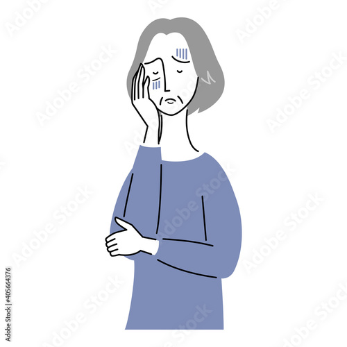 青ざめ、体調が悪そうなシニア女性