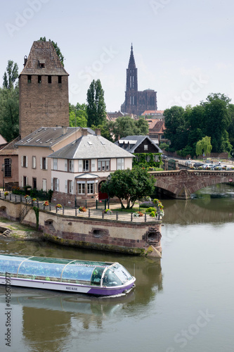 Sightseeing boat in Petite France and cathedral from Ponts Couverts, Strasbourg, France © Nick