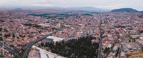 Toluca city  aerial urban landscape  you can see the Bicentennial Towers  main avenues  buildings and neighboring houses 4