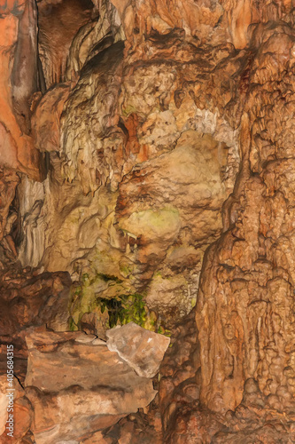 Abstract drawing of an underground cave with stalactites and stalagmites. Limestone karst formation. Travel and vacation concept. Digital painting. Abstract naturalism, relief pattern