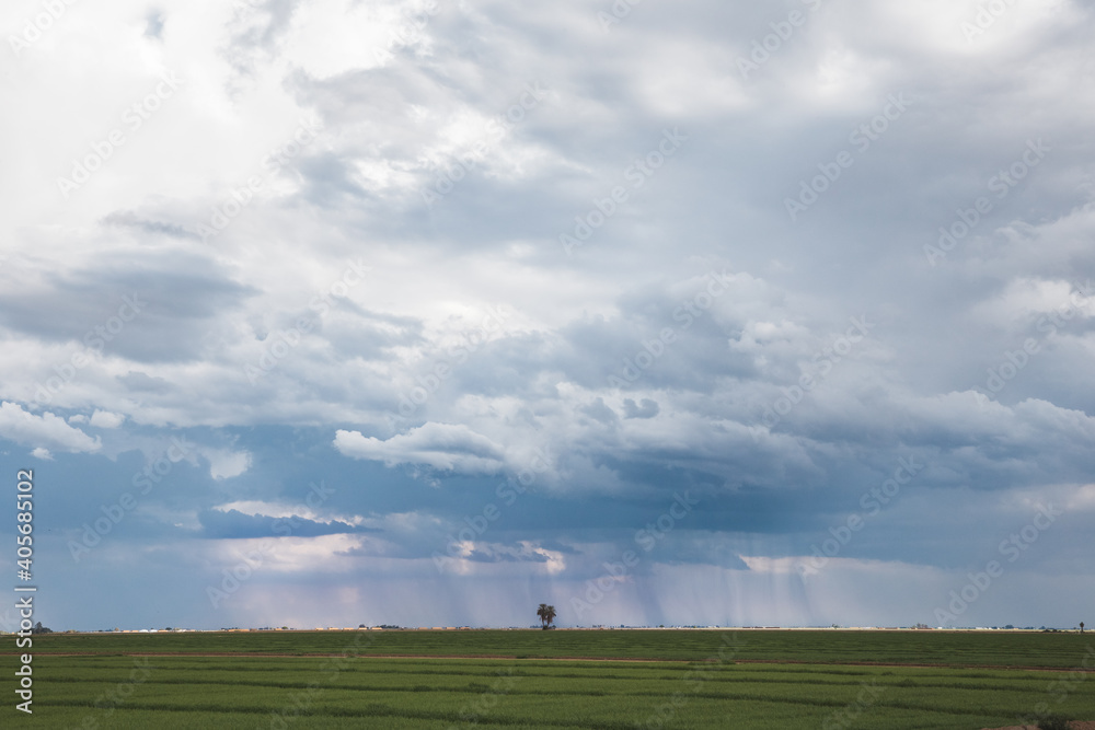 Desert storm clouds above agricultural field in the Imperial Valley, California Desert storm clouds above agricultural field in the Imperial Valley, California
