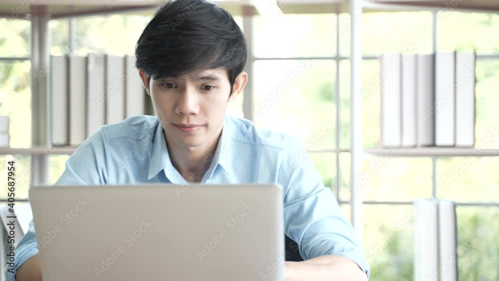 young business worker working online with a digital laptop computer device, new normal lifestyle for working with home detention, self-isolated state quarantine for coronavirus covid 19 protection young business worker working online with a digital laptop computer device, new normal lifestyle for working with home detention, self-isolated state quarantine for coronavirus covid 19 protection