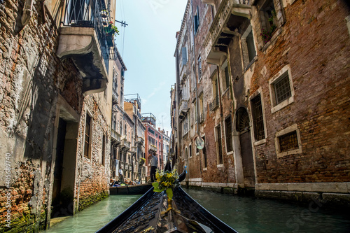Ride a gondola through the canals of Venice