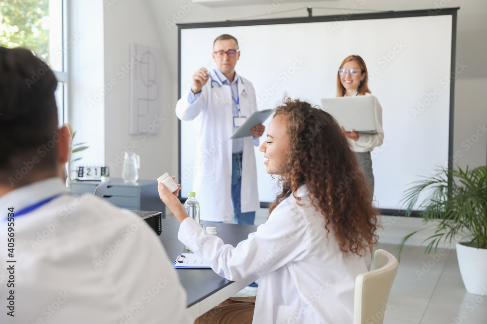 Fototapeta premium Team of doctors during meeting in modern clinic