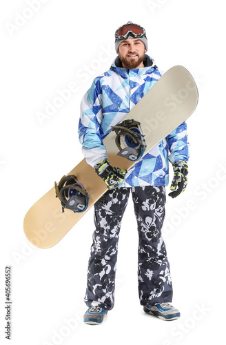 Male snowboarder on white b...