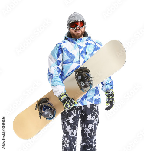 Male snowboarder on white b...