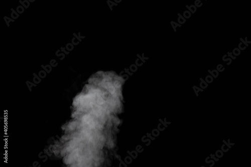 White smoke on black background. Figured smoke on a dark background. Abstract background, design element, for overlay on pictures © Alena
