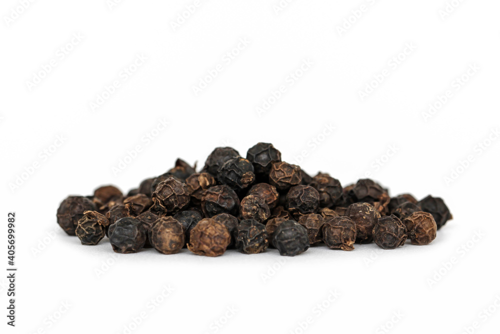 Black peppercorns isolated on white background. Black peppercorns isolated on white background.