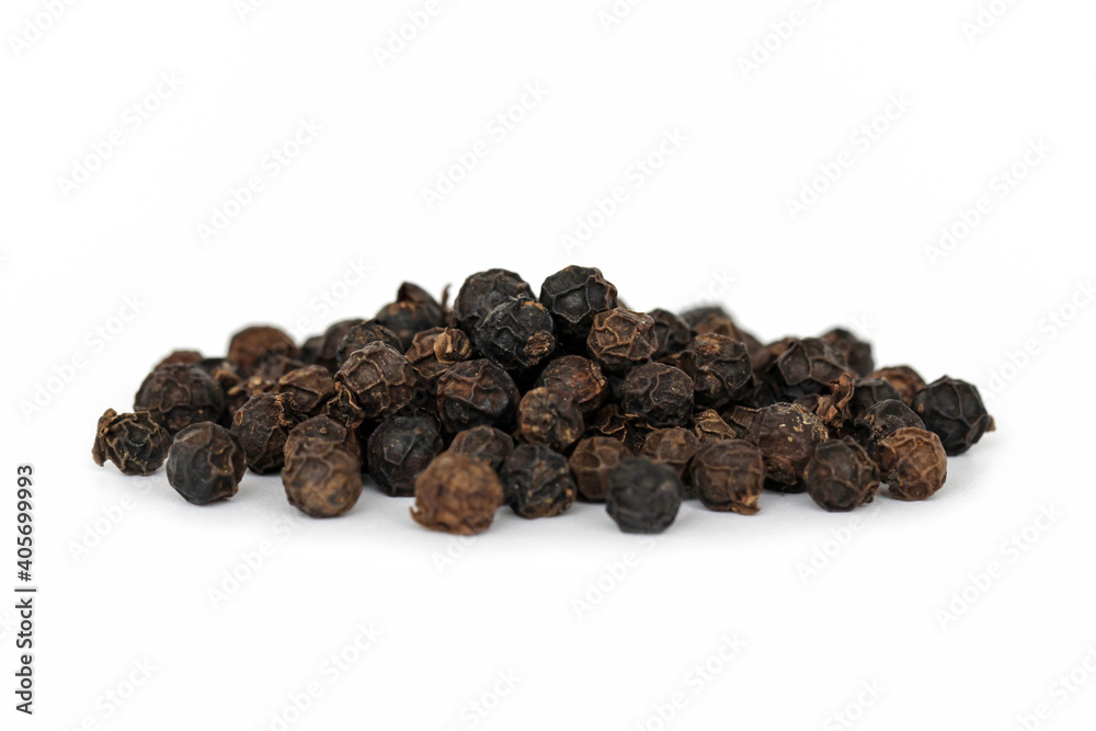 Black peppercorns isolated on white background. Black peppercorns isolated on white background.