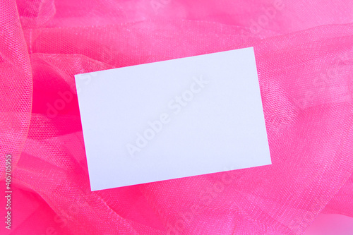 empty business card on the background texture fine fabric tulle mock-up