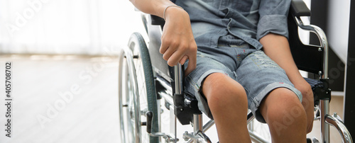 Disability patient sitting on wheelchair in hospital, Banner with copy space photo