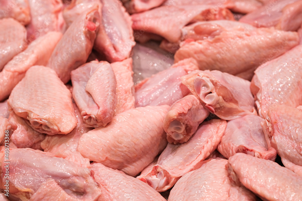 Fresh chicken wings - Raw Chicken wing marinated sauce in bowl. For cooking fried, Is delicious food. Fresh chicken wings - Raw Chicken wing marinated sauce in bowl. For cooking fried, Is delicious food.