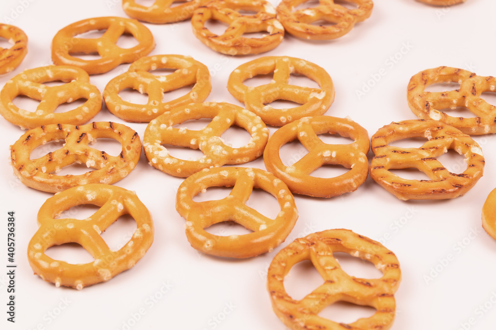 about ten pretzels are scattered chaotically about ten pretzels are scattered chaotically