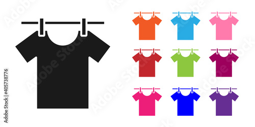 Black Drying clothes icon isolated on white background. Clean shirt. Wash clothes on a rope with clothespins. Clothing care and tidiness. Set icons colorful. Vector.