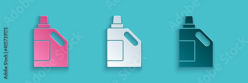 Paper cut Plastic bottle for laundry detergent, bleach, dishwashing liquid or another cleaning agent icon isolated on blue background. Paper art style. Vector.