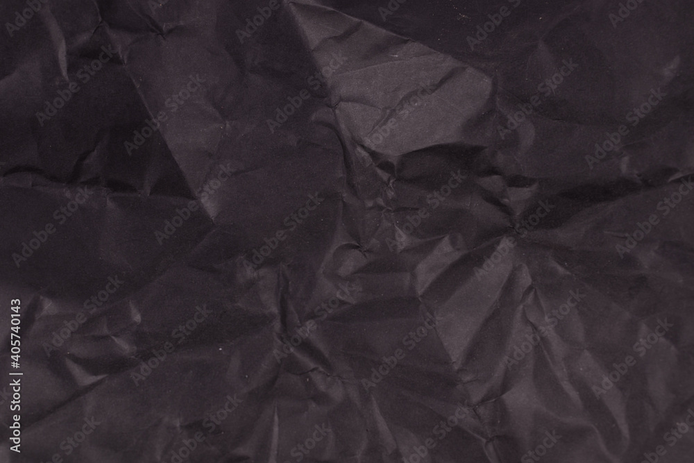 black paper is unevenly wrinkled black paper is unevenly wrinkled