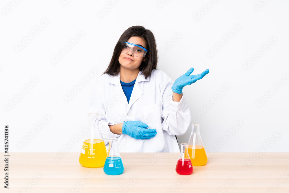 Young scientific woman in a table unhappy for not understand something Young scientific woman in a table unhappy for not understand something
