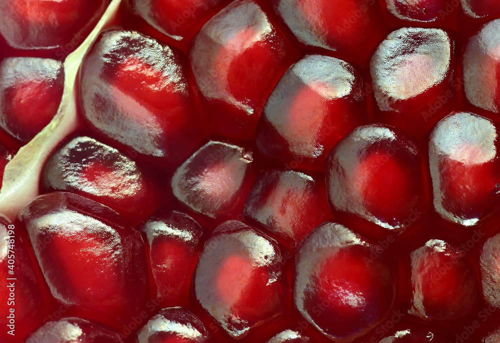 Pomegranate berries close up. Macro photo. Pomegranate berries close up. Macro photo.