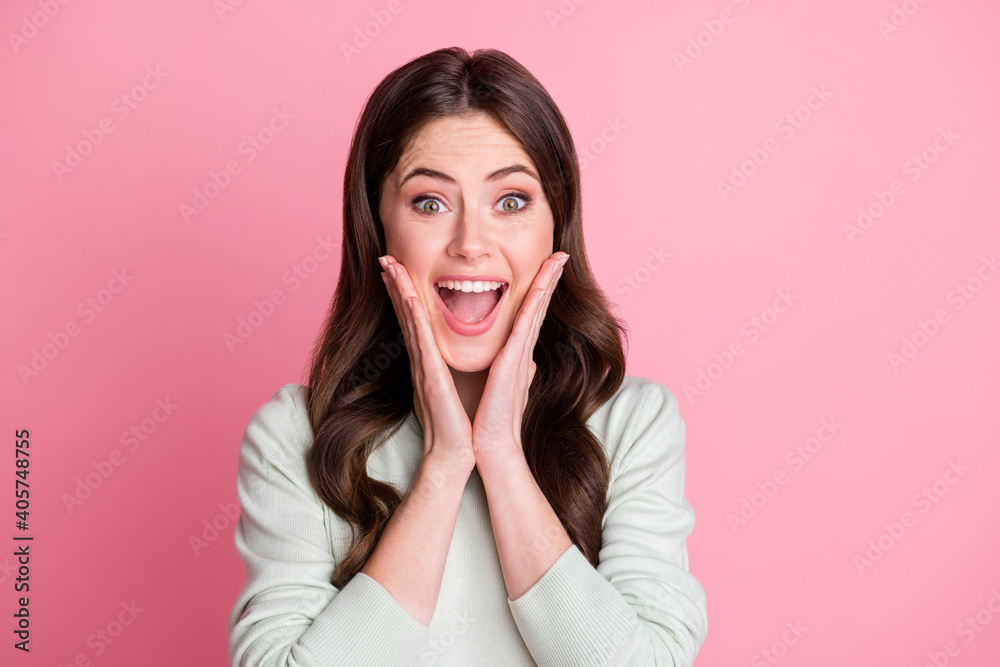 Portrait of impressed cheerful person arms on cheers open mouth isolated on pastel pink color background Portrait of impressed cheerful person arms on cheers open mouth isolated on pastel pink color background